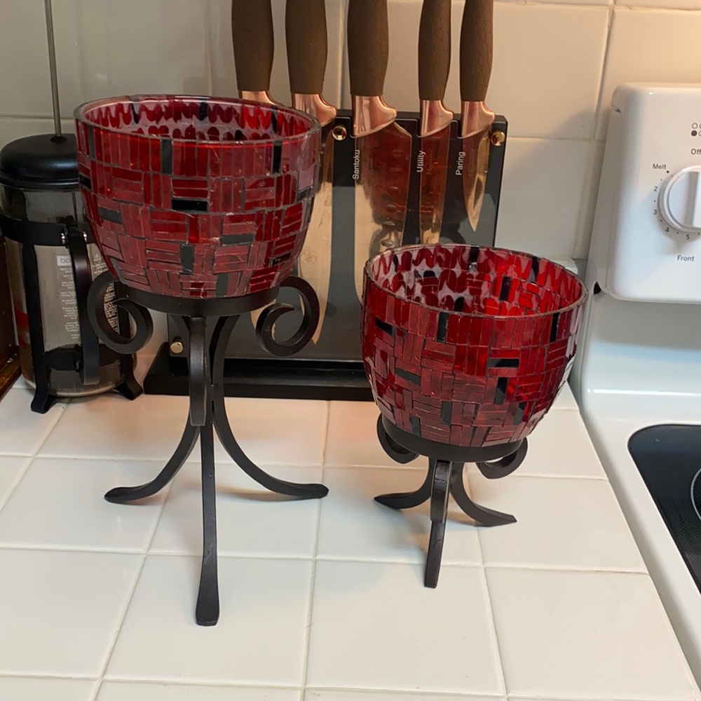 Lot of two red vases/candle holders